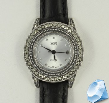 Серебряные наручные часы с марказитами
